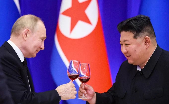 普京致电祝贺金正恩在...